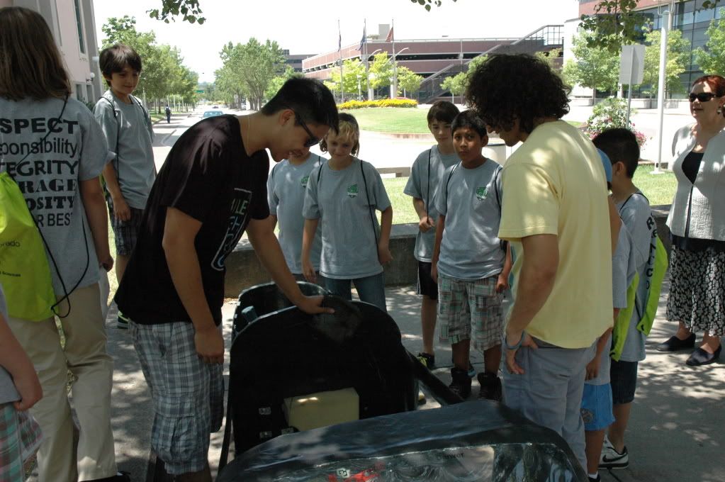 Cole Middle School Students look at a hydrogen-fuel-cell-powered car at Auraria Campus